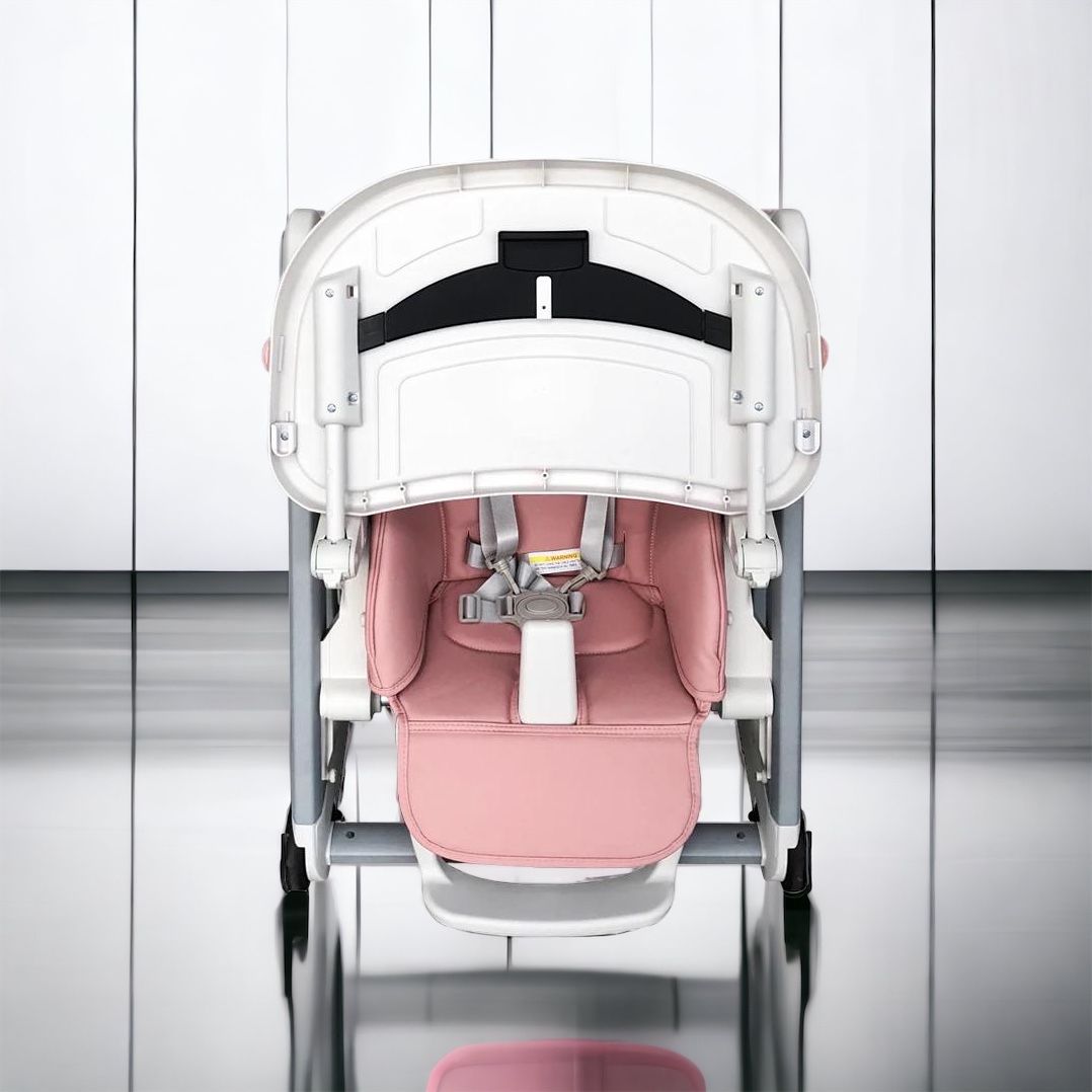 Luxury baby high chair that converts into a rocker with 5-point harness and wheels for easy movement